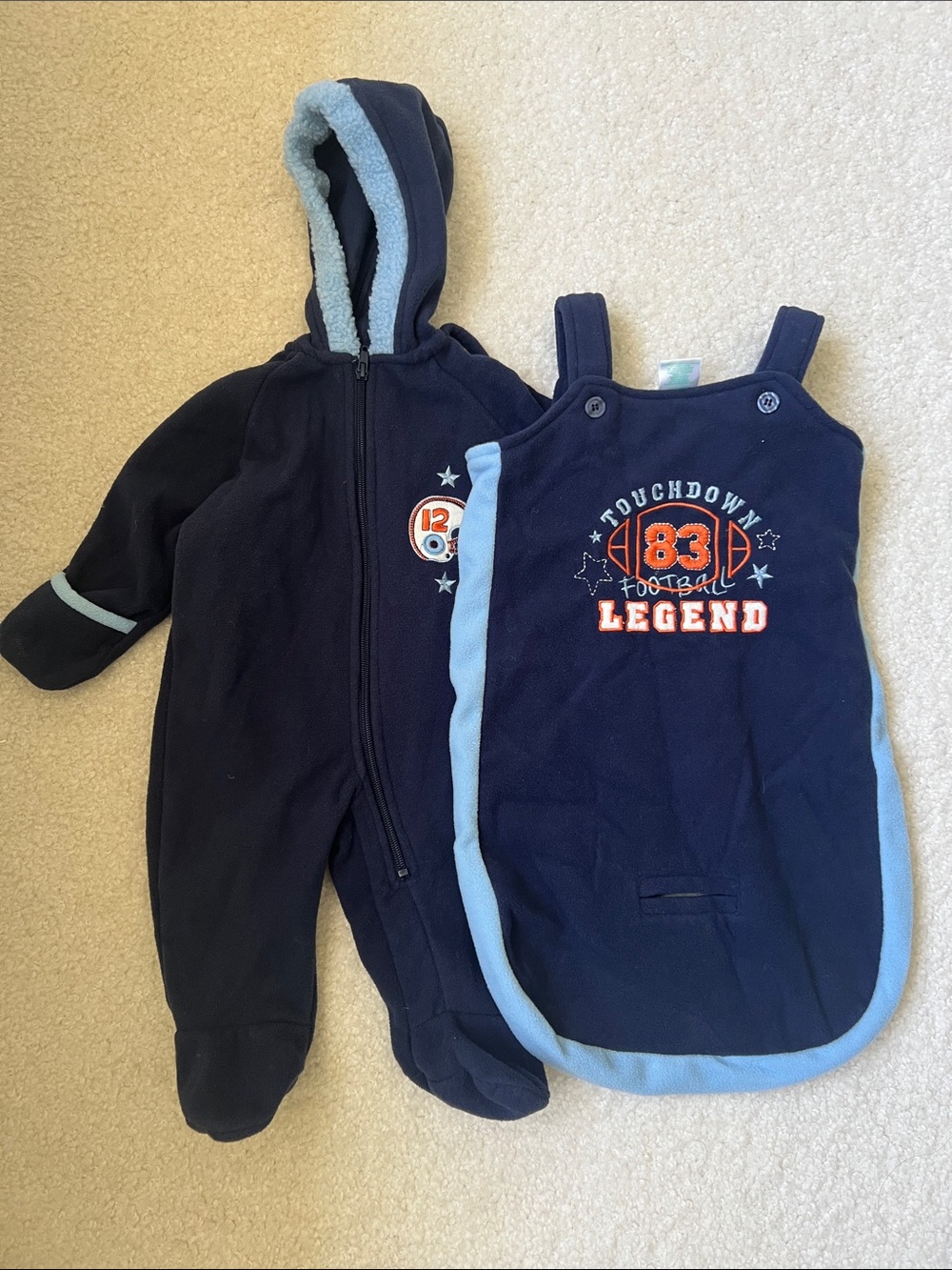 navy blue Okie Dokie baby boy fleece bunting suit with light blue trim